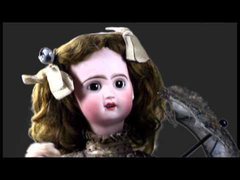 Autómata Bebé con sombrilla del Museo Art Nouveau y Art Decó Casa Lis